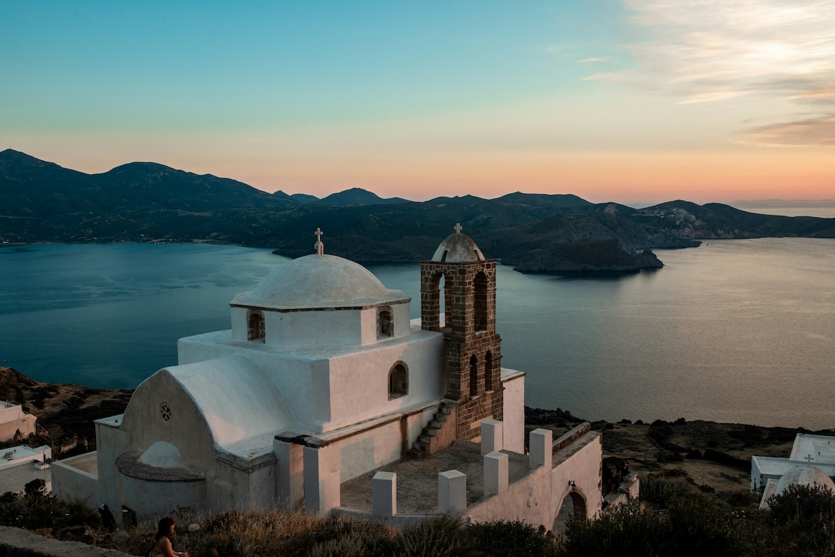 sunset view from greek island over white building